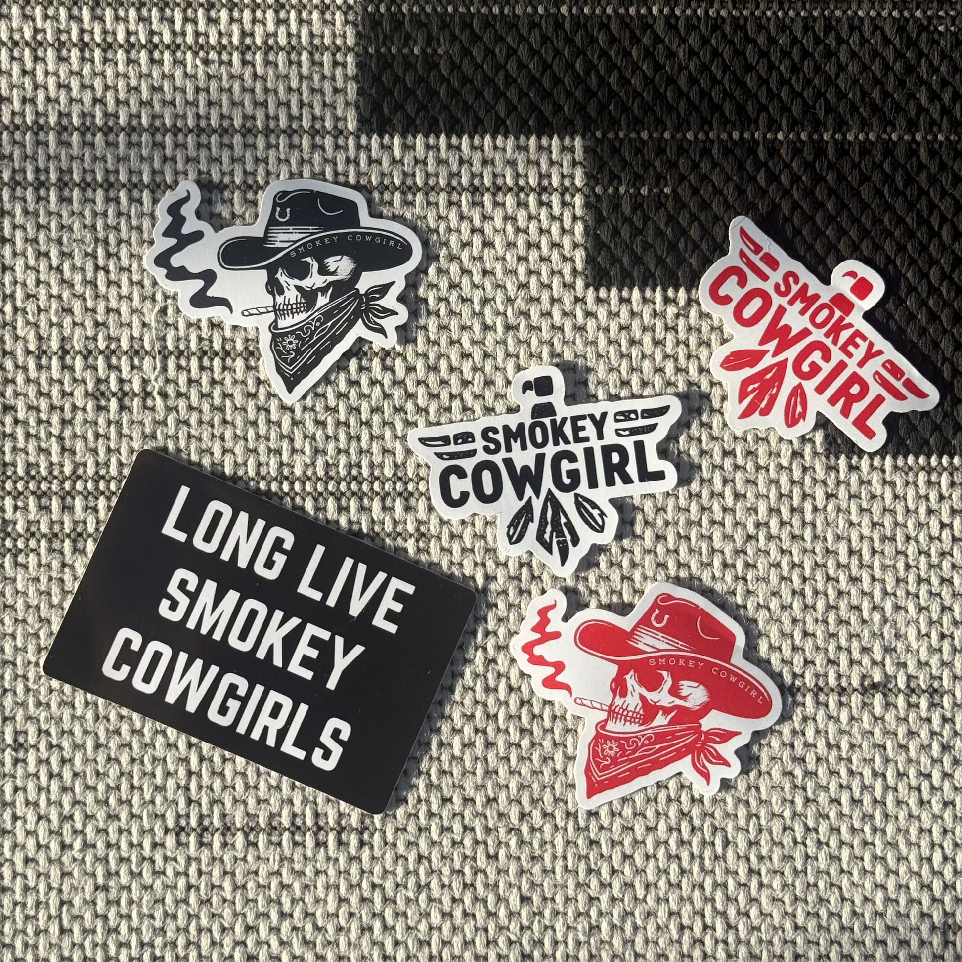 Set of stickers with text and graphics on a textured fabric background