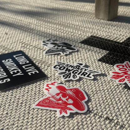 Collection of stickers on a textured surface