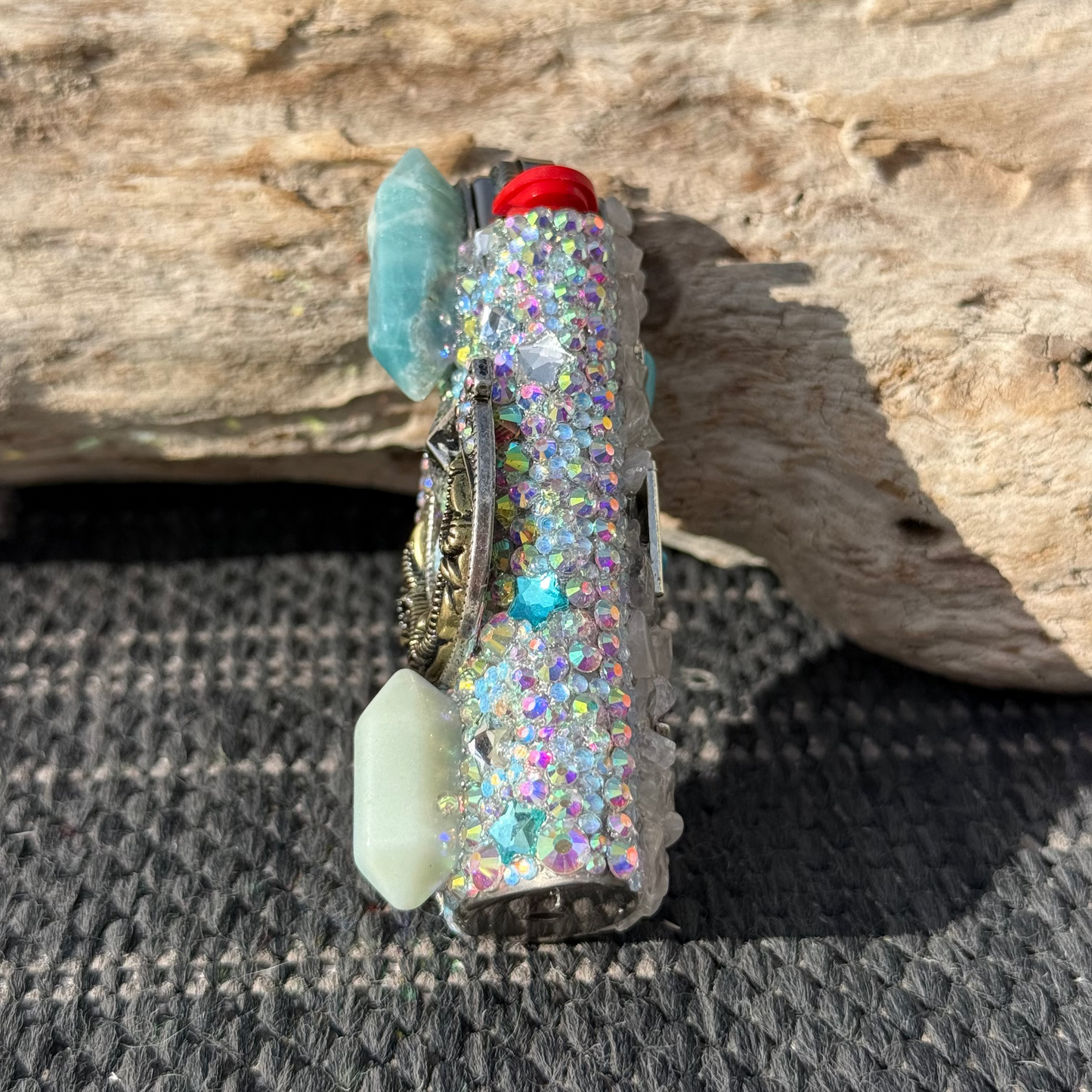 Decorative case with glittery details on a textured surface