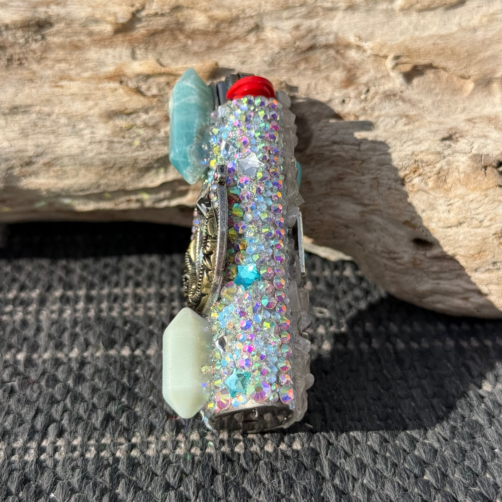 Decorative case with glittery details on a textured surface